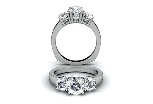 A computer rendering of a three-stone diamond engagement ring in white metal, shown upright and lying flat
